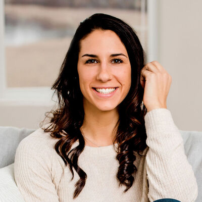 Rachel Lucas sitting on a couch