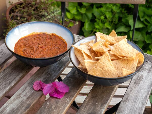 True Primal Beef Chili in bowl with grain-free tortilla chips