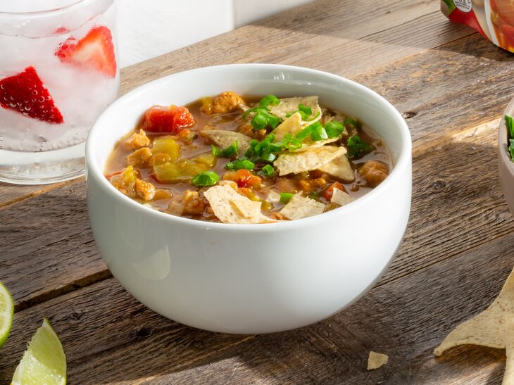 True Primal Southwest-Style Chicken Soup in bowl with crushed chips