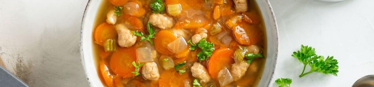 chicken soup on table