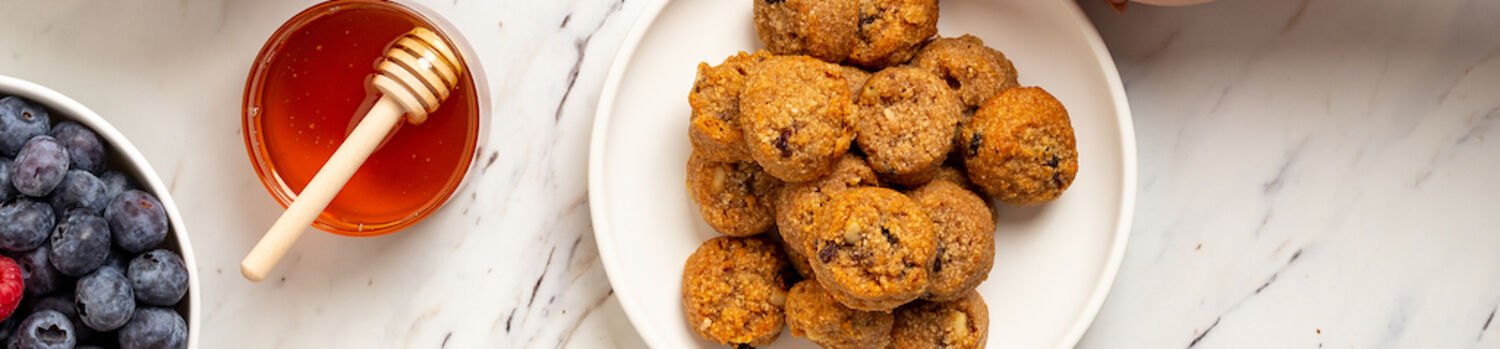 cookies with honey dipper and berries