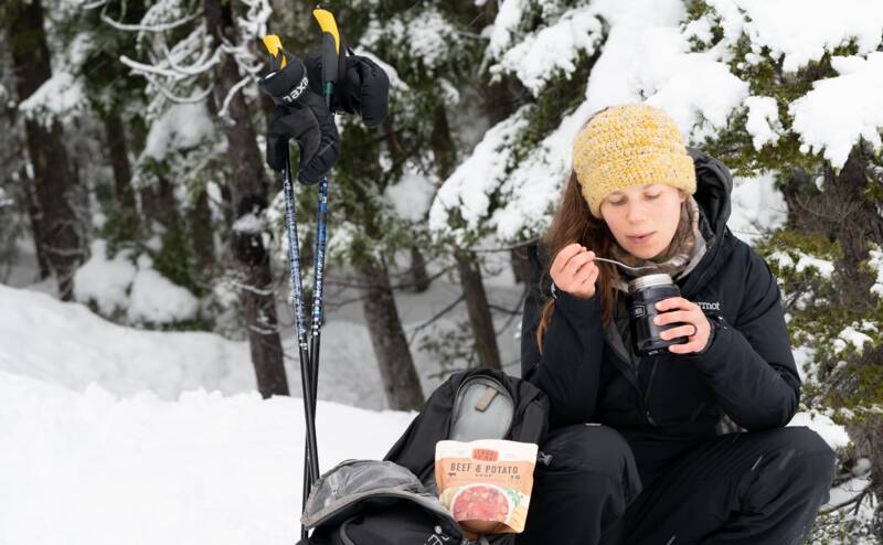eating soup out of a thermos