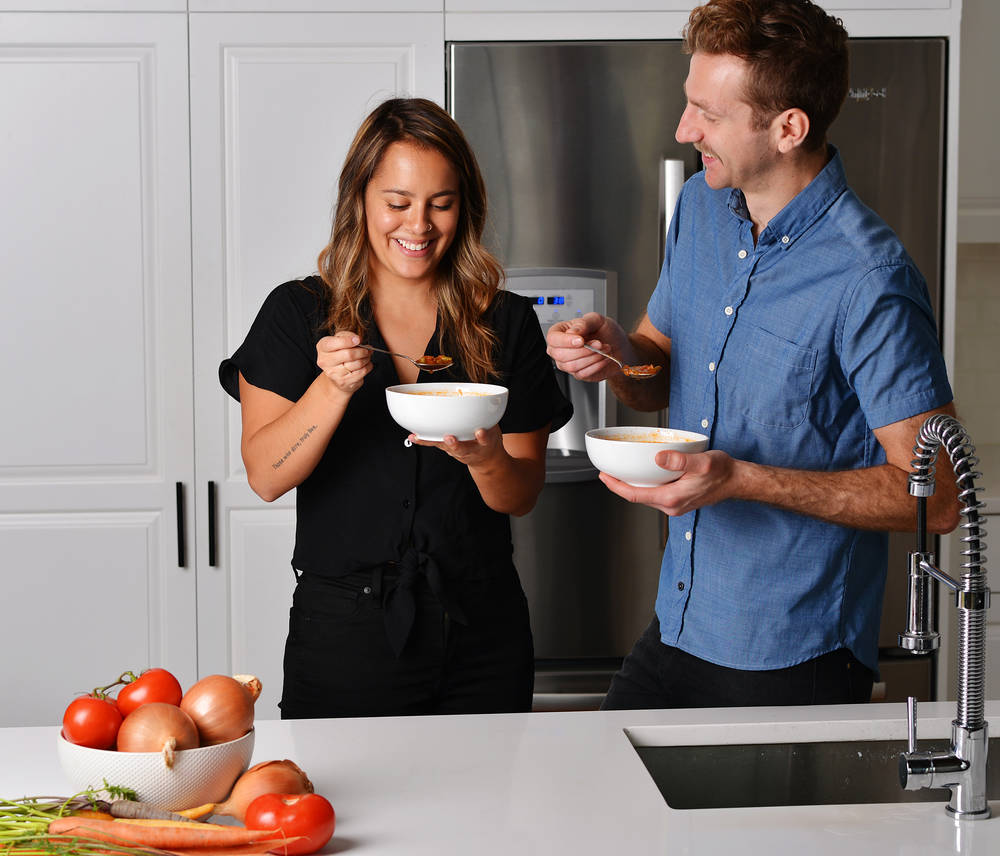 people eating yummy soup