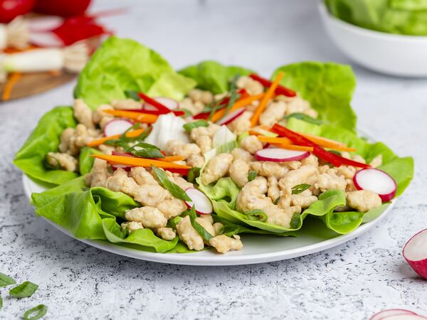 True Primal Pastured Chicken Mini Meatballs in lettuce cups on plate