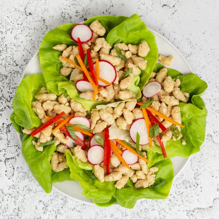 True Primal Pastured Chicken Mini Meatballs on lettuce leaves