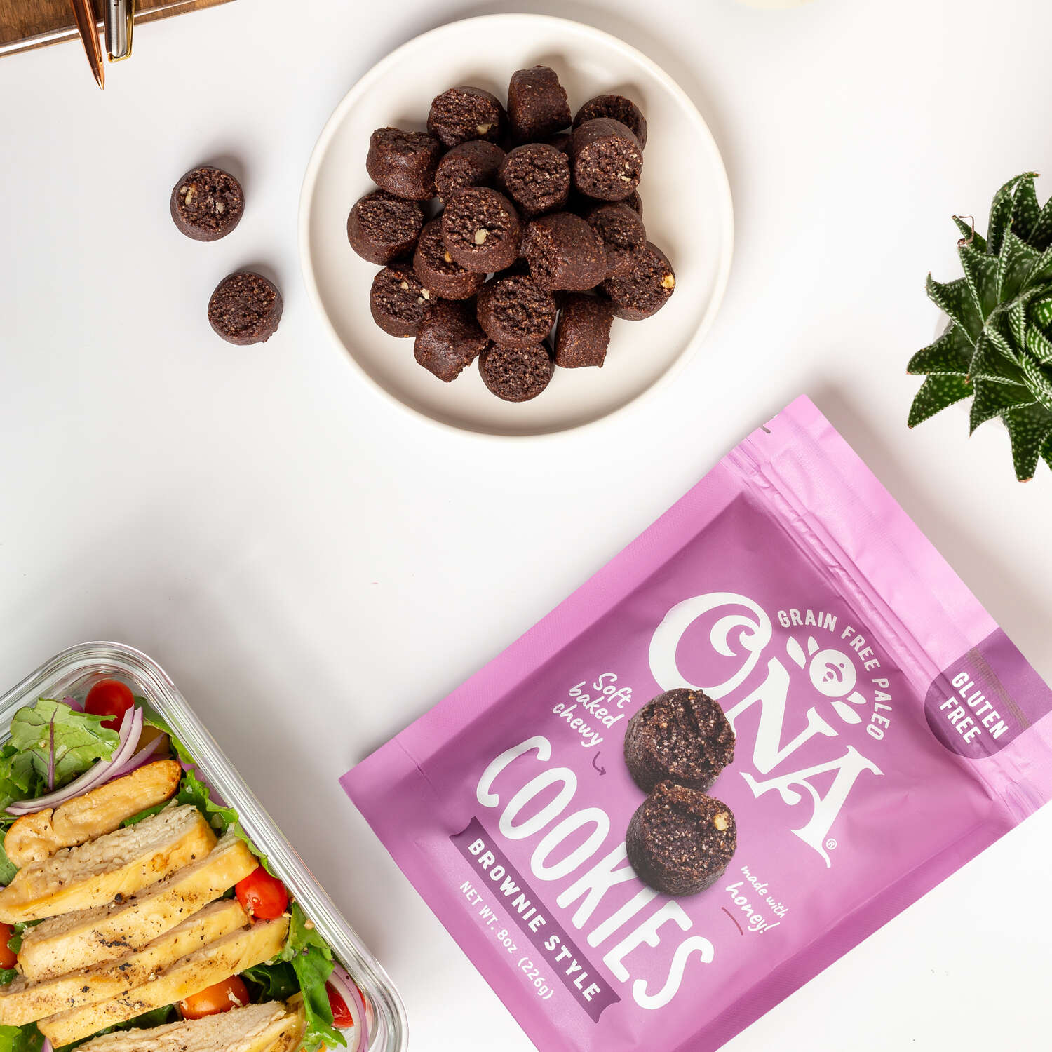 Ona Brownie-Style Cookies on a plate with salad lunch at work