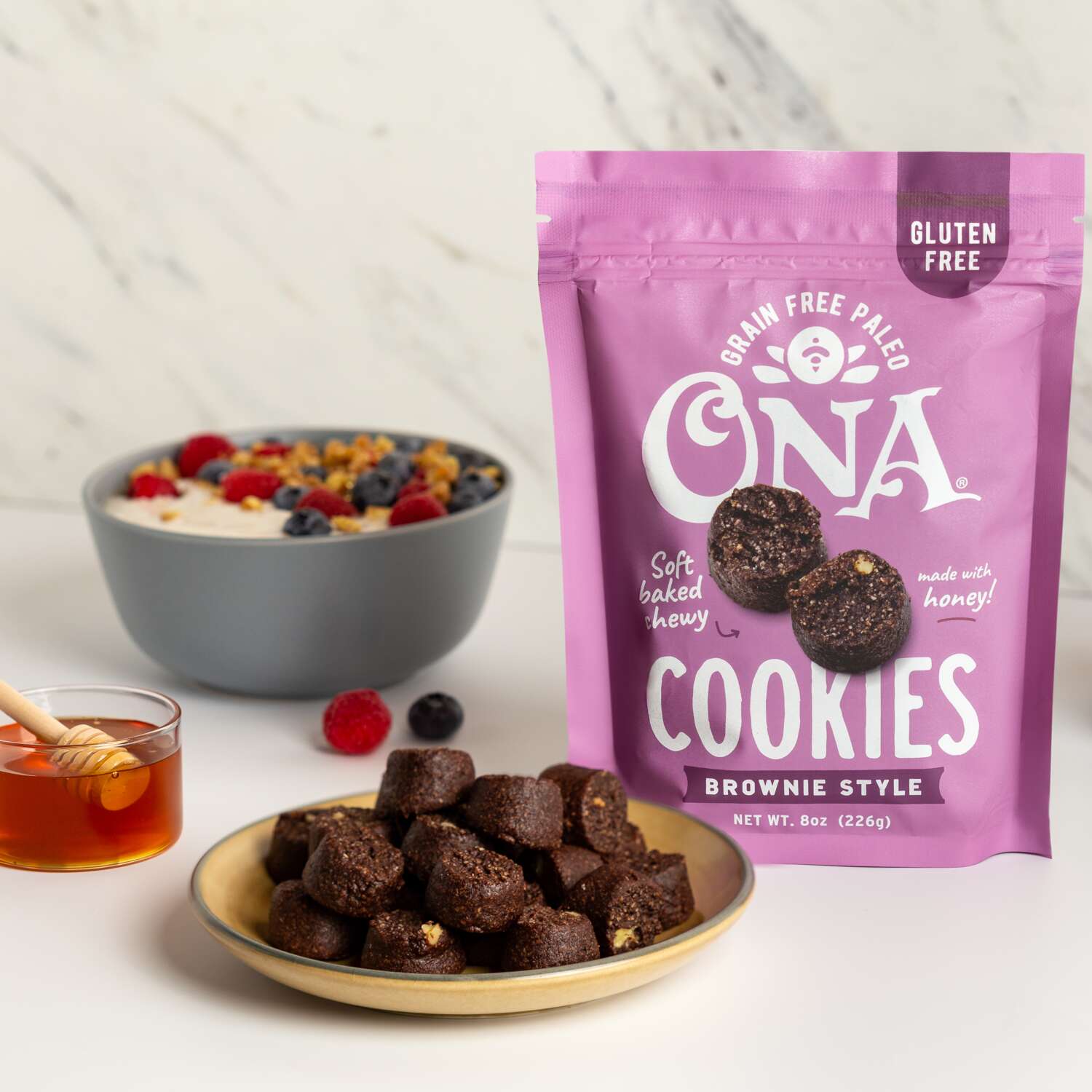 Ona Brownie-Style Cookies with berries and honey dipper