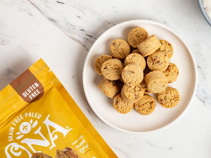 Ona Maple Pecan Cookies on plate next to their pouch