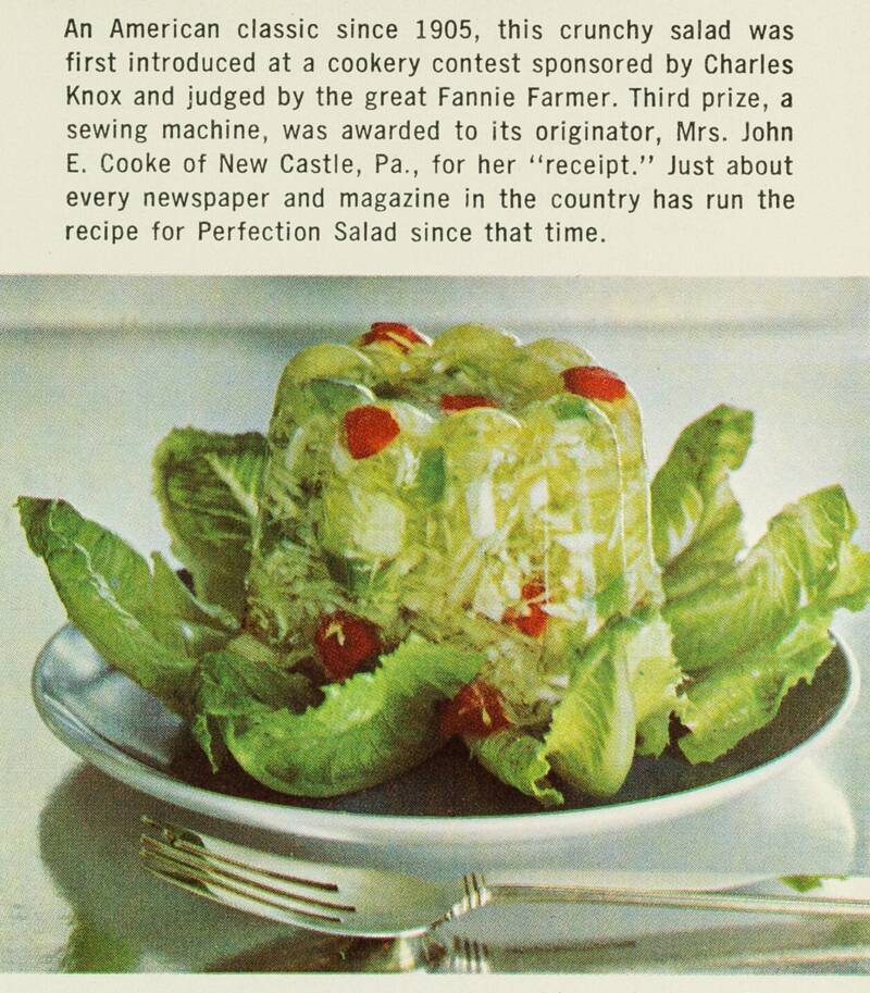 green salad with a large gelatin mold in the center