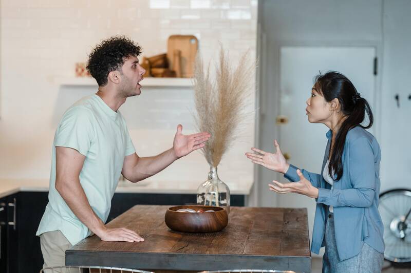 man and woman arguing